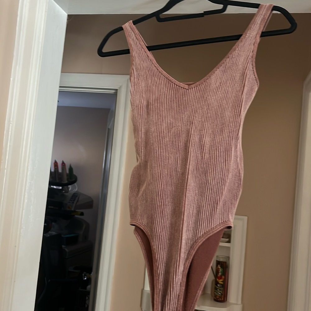 Aura
Size S bodysuit